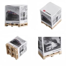 A cube of sticky notes sits on a wooden pallet, featuring a multicoloured design and branding on all sides.