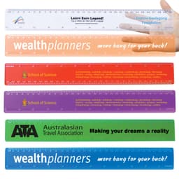 A collection of transparent rulers in various colors, each with different logos and promotional text.