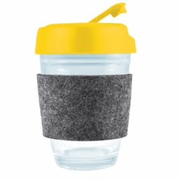 A reusable coffee cup with a yellow flip lid and a gray felt band around a transparent body. Features a logo.