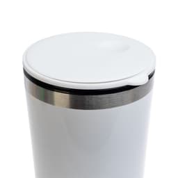 A reusable coffee cup in white with a silver metallic band and a white lid, featuring a small opening for sipping.