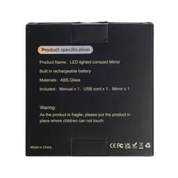 A black box containing product specifications for a LED compact mirror, including materials and included items.