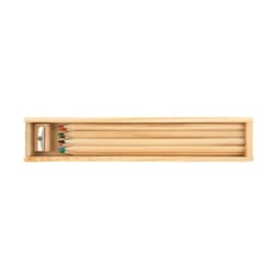 A wooden box containing a set of five coloured pencils in various colors, including green, red, and blue, with a sharpener.