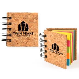 A cork sticky notes book with colorful sticky notes inside, featuring a logo on the cover.