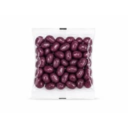 A clear cello bag filled with shiny, purple jelly beans. The bag is sealed at the top.
