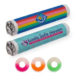 Assorted flavour fruit rings in various colours, including pink, orange, and green, with packaging featuring logos.