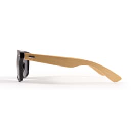 A pair of sunglasses featuring black lenses and bamboo-style arms, with a minimalist design and a logo on the frame.