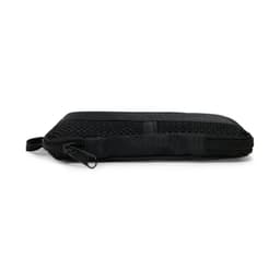 A black sports towel with a textured surface and a zippered compartment, featuring a logo.