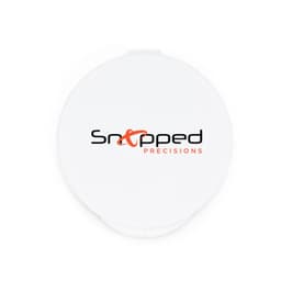 A white circular container with a logo in black and orange featuring the text "Snapped Precisions".