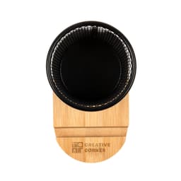 A black wire mesh pen tidy with a bamboo base. The base features a logo.