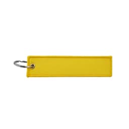 A yellow woven keytag with a metal ring for attaching keys. It has a simple, rectangular design.