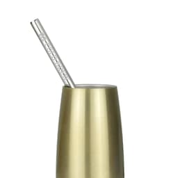 A stainless steel straw in a gold-coloured drink bottle, featuring a simple logo on the straw.