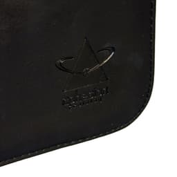A black compendium with a subtle logo embossed on the front, featuring smooth, sleek leather material.