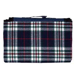 A folded picnic rug with a navy, green, and red tartan pattern, featuring a handle for carrying.