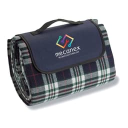 A folded picnic rug in dark blue and green plaid, featuring a handle and a logo.
