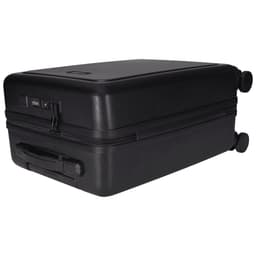 A black wheeled cabin trolley with a sturdy handle, featuring a zip closure and two wheels for easy transport.