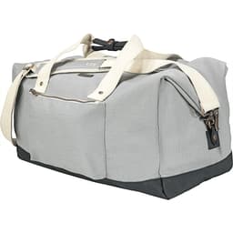 A grey cotton duffel bag with a darker base and cream straps, featuring a logo on the side.
