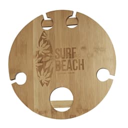 A round bamboo picnic table featuring cutouts for drinks and a logo, in natural wood colour.