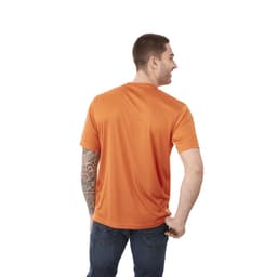 A man wearing an orange short sleeve tech tee, featuring a logo, showing the back view with a tattoo on his arm.