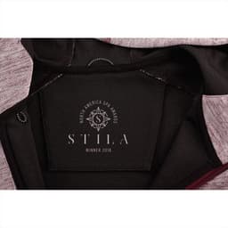 A maroon and grey zip-up hoodie with a logo inside the collar area.