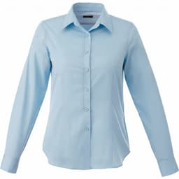 A light blue women's button-up shirt with a collared neckline and long sleeves, featuring a logo on the fabric.