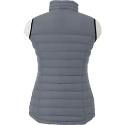 A grey women's light down vest with a high collar and stitched panels, featuring a logo on the back.