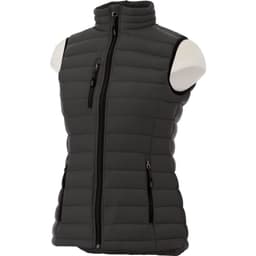 A lightweight women's down vest in dark grey, featuring zippered pockets and a high collar.