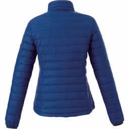 A blue women's puffer jacket with a sleek design, featuring a high collar and fitted sleeves. It has a logo on one sleeve.