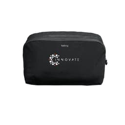 A black packing cube with a zip closure and a mesh top, featuring a logo on the front.