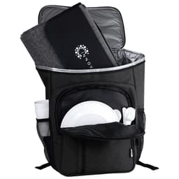A grey picnic backpack with a thermal compartment, containing a blanket, plates, cutlery, and drink bottles.