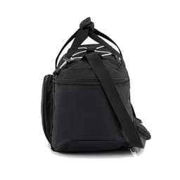 A black travel duffel bag featuring a zippered main compartment and a detachable shoulder strap, with some branding visible.