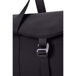 A black duffel bag with a textured finish and a clasp closure, featuring a strap for carrying.