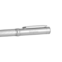 A silver ballpoint pen with a twisted design and a clip, featuring a branding element.