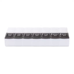A clear, weekly pill case with black lids for each day, featuring labels for AM and PM. It has a branded logo.