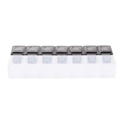 A clear pill case with grey lids labelled for each day and time for medication organisation.