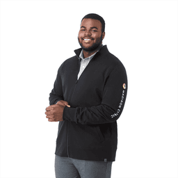 A man is wearing a black full zip fleece jacket with a logo on the sleeve. The jacket features a high collar.