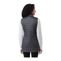 A woman wearing a dark grey lightweight packable insulated puffer vest, viewed from the back. The vest has a logo.