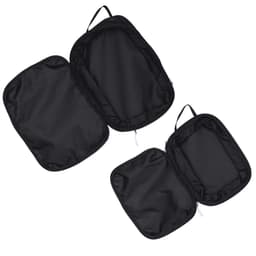 A set of three black compression packing cubes with zippers and handles for easy organisation.