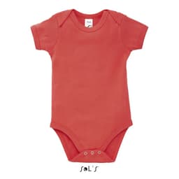 A coral baby bodysuit with short sleeves and snap closures at the bottom, featuring a logo tag.