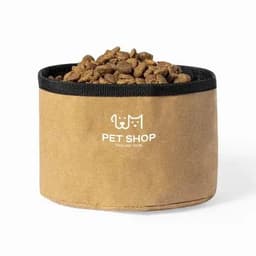 A pet food storage container in a tan colour, filled with kibble, featuring a logo on the front.