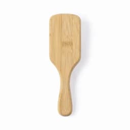 A bamboo spatula with a flat head and a smooth handle, showcasing natural wood grain.