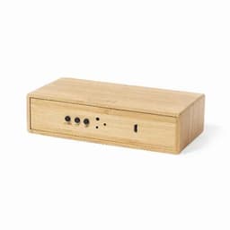 A wooden speaker with a sleek design, featuring control buttons and a USB port on the front.