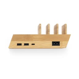 A bamboo charging station with multiple slots and various ports, including USB and USB-C options.