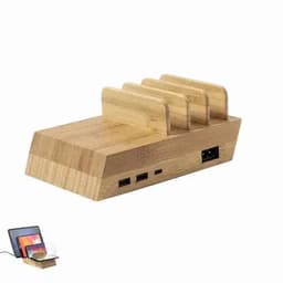 A bamboo charging station with multiple slots and USB ports, featuring a sleek, natural wood finish.