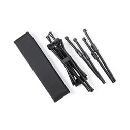 A collapsible black camping tent pole set laid out beside a black carrying pouch.