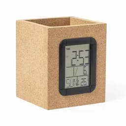 A square cork clock with a digital display showing time and date. The edges are lined with black material.
