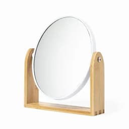 A round tabletop mirror with a wooden stand, featuring a natural bamboo finish and a sleek white border.