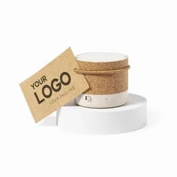 A drink bottle with a cork and white body, featuring a leather strap and a blank tag for branding.