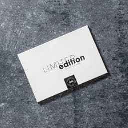 A rectangular white box with the words "LIMITED edition EXPERIENCE" in black text, featuring a logo on the bottom.