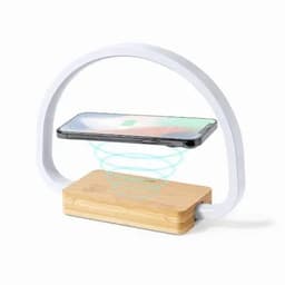 A wireless phone charger with a wooden base and a white arch design, featuring a phone suspended in mid-air.