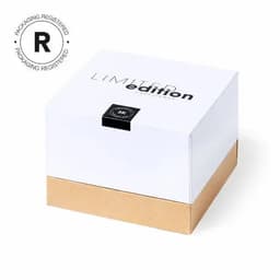 A white and tan box with a minimalistic design, featuring a logo and text indicating a limited edition product.